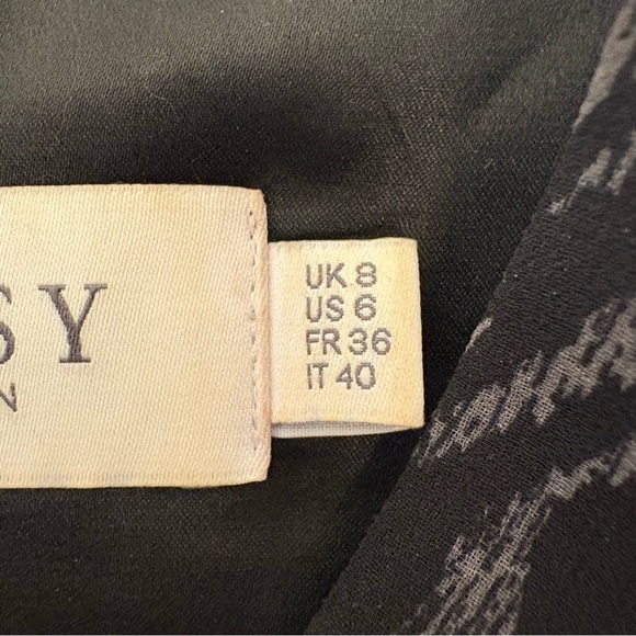 Lipsy Black sleeveless dress with a cool pattern, zipper, hooks and buttons. - Picture 7 of 10